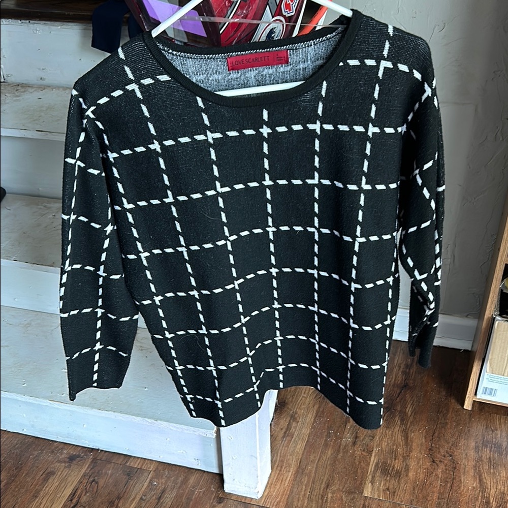 Chic Black Sweater with White Grid Pattern